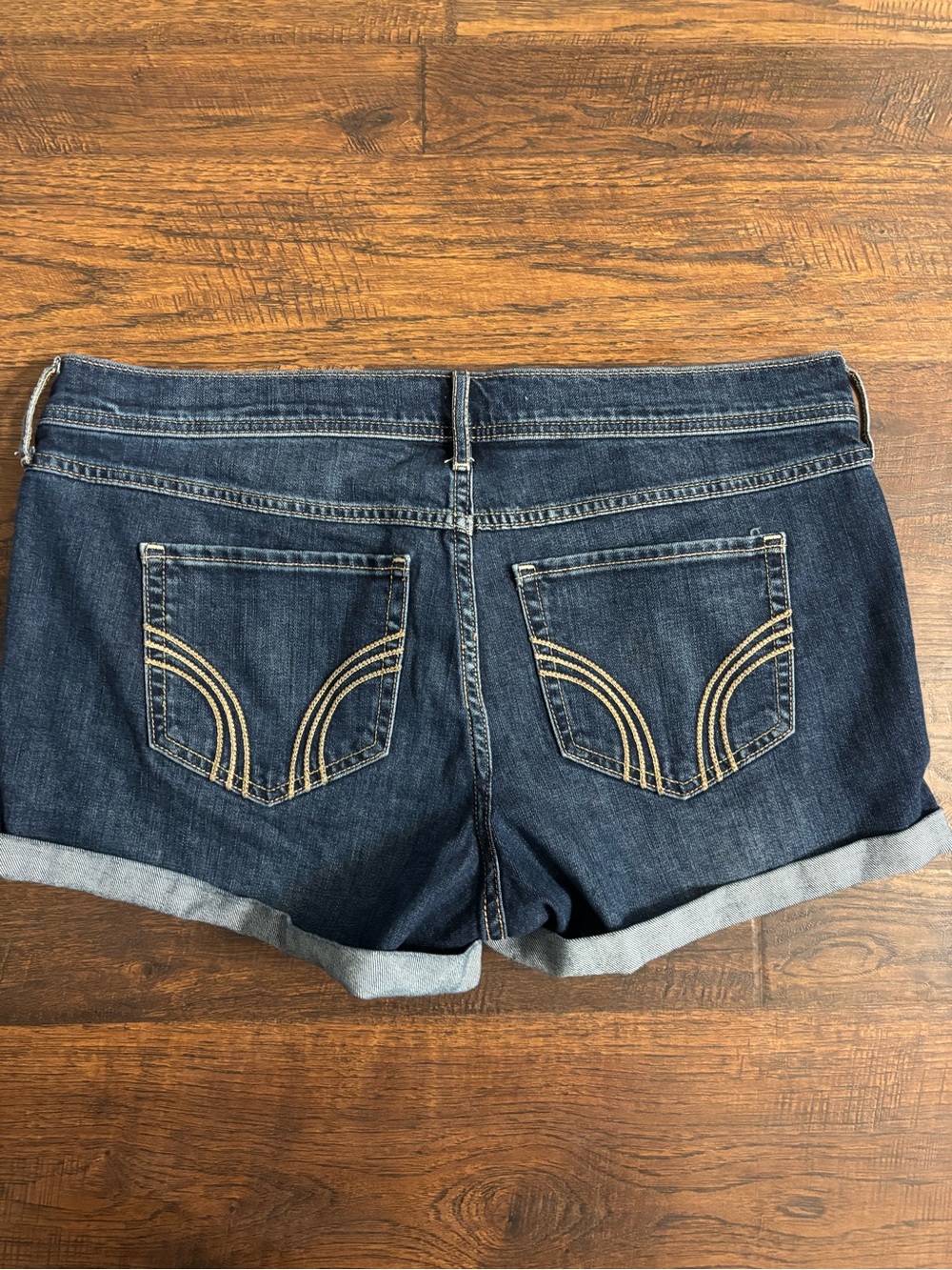 Y2K Hollister low-rise distressed denim shortie shorts in a medium wash size 15